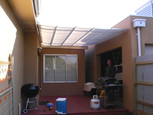 PLEATED PATIO AWNING ON TRACKS