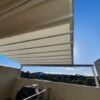 Retractable Shade balcony awning providing outdoor coverage