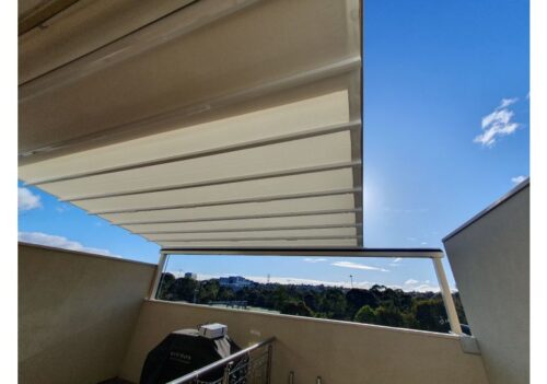 Retractable Shade balcony awning providing outdoor coverage