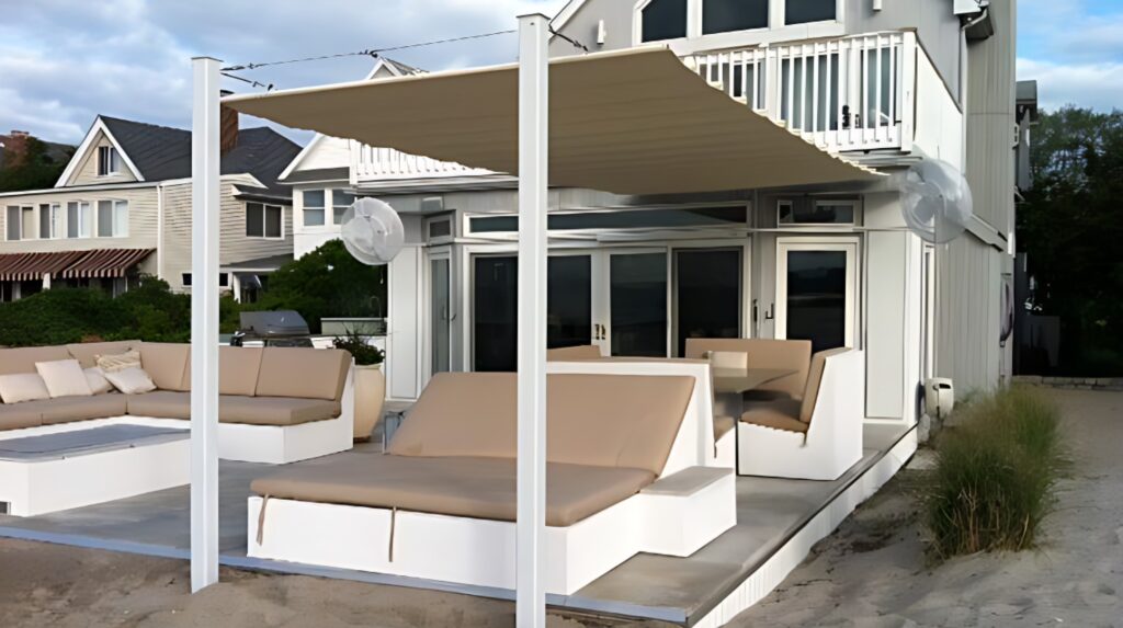 Retractable Shade motorised outdoor awning system covering café style seating area