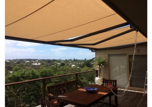 beige folding arm retractable awning
