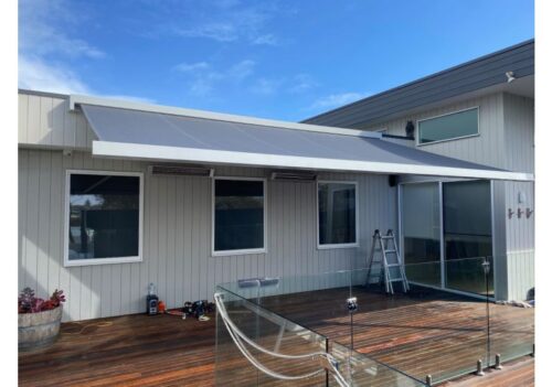 retractable folding arm awning